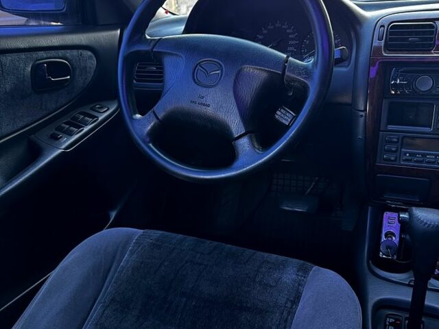 Зеленый Мазда 626, объемом двигателя 2 л и пробегом 185 тыс. км за 2350 $, фото 7 на Automoto.ua