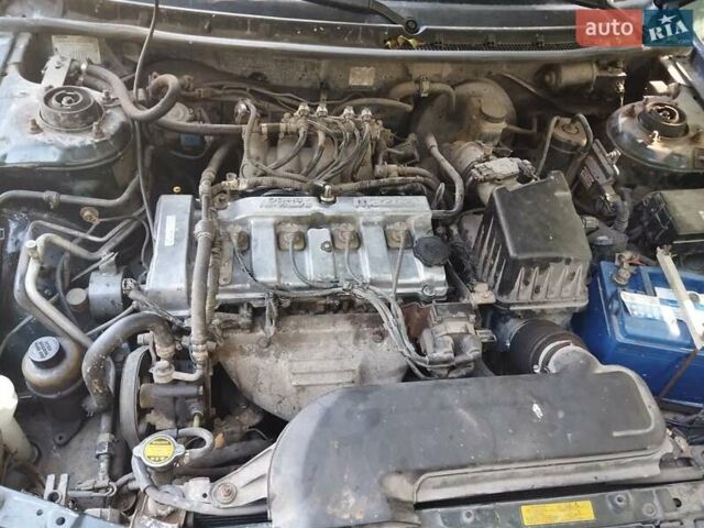 Зеленый Мазда 626, объемом двигателя 1.84 л и пробегом 421 тыс. км за 2500 $, фото 4 на Automoto.ua