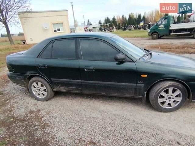 Зеленый Мазда 626, объемом двигателя 1.84 л и пробегом 421 тыс. км за 2500 $, фото 5 на Automoto.ua