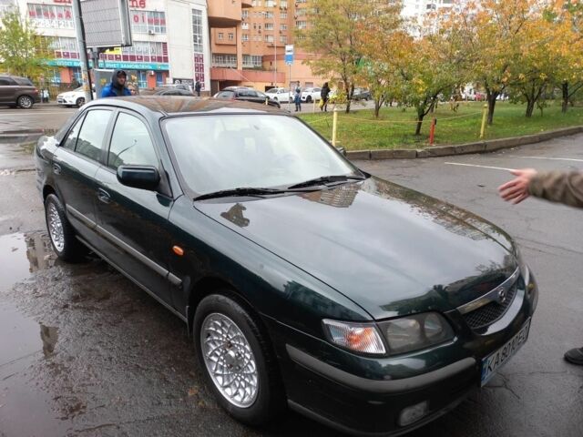 Зеленый Мазда 626, объемом двигателя 2 л и пробегом 250 тыс. км за 3600 $, фото 1 на Automoto.ua