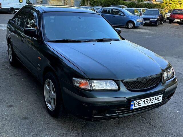 Зеленый Мазда 626, объемом двигателя 2 л и пробегом 185 тыс. км за 2350 $, фото 1 на Automoto.ua