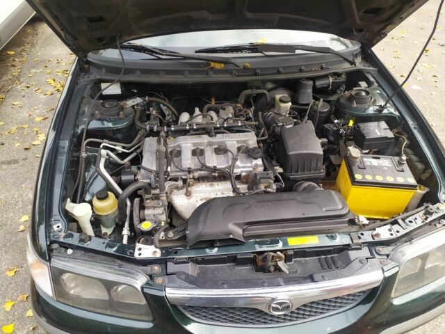 Зеленый Мазда 626, объемом двигателя 2 л и пробегом 250 тыс. км за 3600 $, фото 5 на Automoto.ua