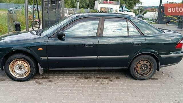 Зеленый Мазда 626, объемом двигателя 1.84 л и пробегом 319 тыс. км за 1700 $, фото 2 на Automoto.ua