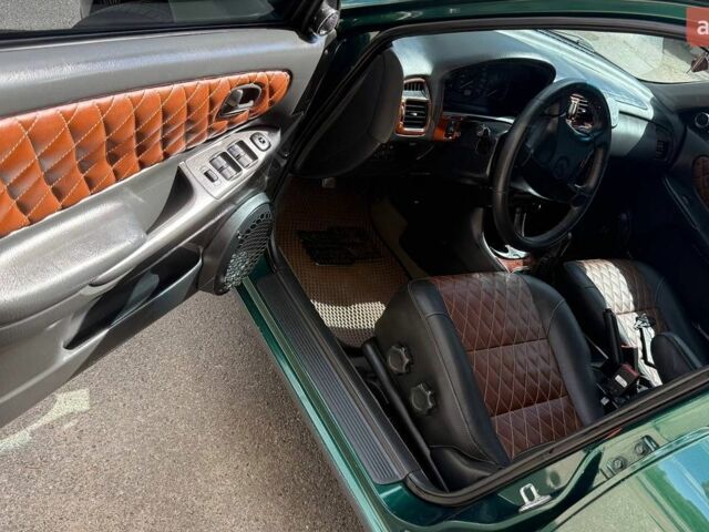 Зелений Мазда 626, об'ємом двигуна 2 л та пробігом 340 тис. км за 6000 $, фото 38 на Automoto.ua