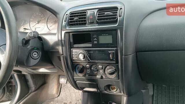 Зеленый Мазда 626, объемом двигателя 1.84 л и пробегом 319 тыс. км за 1700 $, фото 9 на Automoto.ua