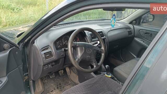 Зеленый Мазда 626, объемом двигателя 1.84 л и пробегом 319 тыс. км за 1700 $, фото 5 на Automoto.ua