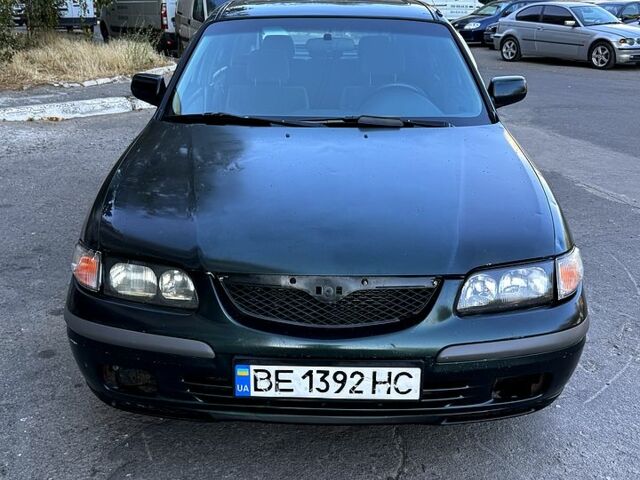 Зеленый Мазда 626, объемом двигателя 2 л и пробегом 185 тыс. км за 2350 $, фото 2 на Automoto.ua