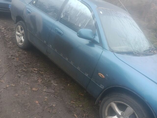 Зелений Мазда 626, об'ємом двигуна 2 л та пробігом 777 тис. км за 426 $, фото 1 на Automoto.ua