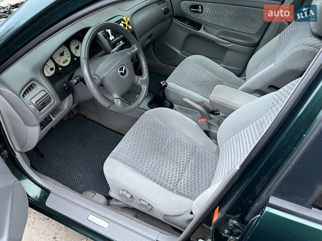 Зеленый Мазда 626, объемом двигателя 2 л и пробегом 286 тыс. км за 3500 $, фото 13 на Automoto.ua