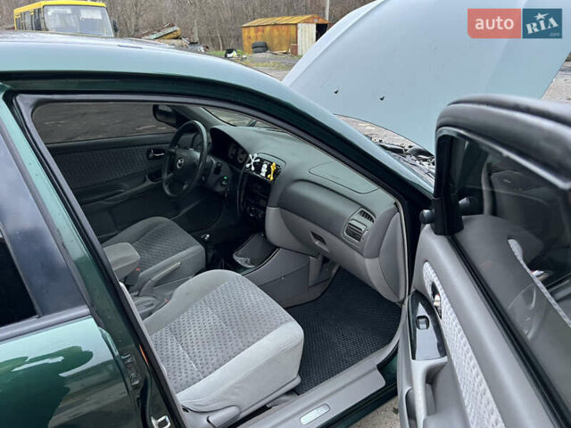 Зеленый Мазда 626, объемом двигателя 2 л и пробегом 286 тыс. км за 3500 $, фото 15 на Automoto.ua