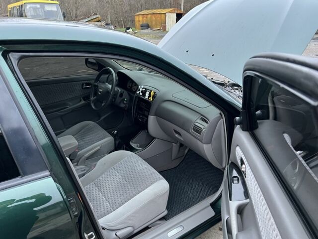 Зеленый Мазда 626, объемом двигателя 2 л и пробегом 286 тыс. км за 3500 $, фото 15 на Automoto.ua