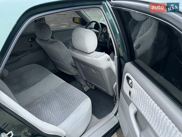 Зеленый Мазда 626, объемом двигателя 2 л и пробегом 286 тыс. км за 3500 $, фото 16 на Automoto.ua