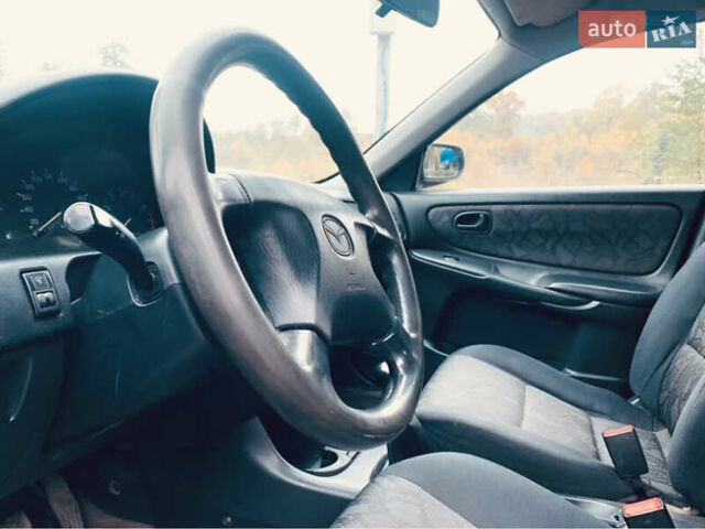 Зеленый Мазда 626, объемом двигателя 1.84 л и пробегом 267 тыс. км за 2500 $, фото 5 на Automoto.ua