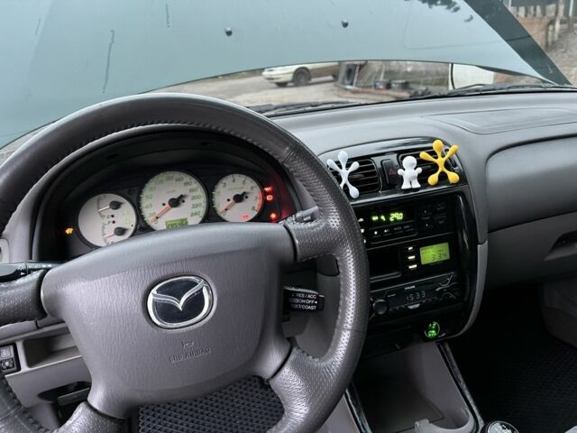 Зеленый Мазда 626, объемом двигателя 2 л и пробегом 286 тыс. км за 3500 $, фото 10 на Automoto.ua