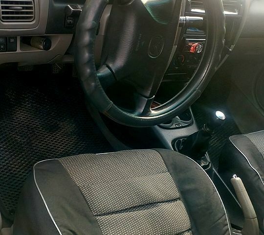 Зеленый Мазда 626, объемом двигателя 1.8 л и пробегом 243 тыс. км за 3400 $, фото 3 на Automoto.ua