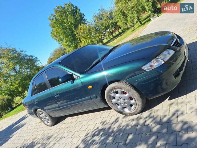 Зеленый Мазда 626, объемом двигателя 2 л и пробегом 285 тыс. км за 2400 $, фото 9 на Automoto.ua