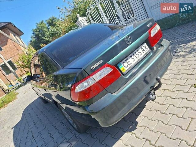 Зеленый Мазда 626, объемом двигателя 2 л и пробегом 285 тыс. км за 2400 $, фото 7 на Automoto.ua