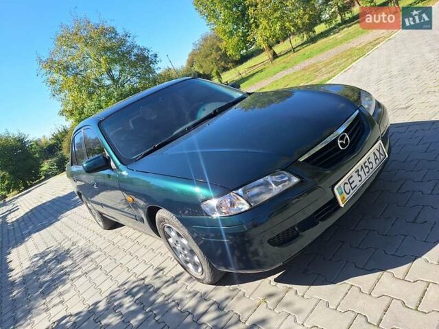 Зеленый Мазда 626, объемом двигателя 2 л и пробегом 285 тыс. км за 2400 $, фото 10 на Automoto.ua
