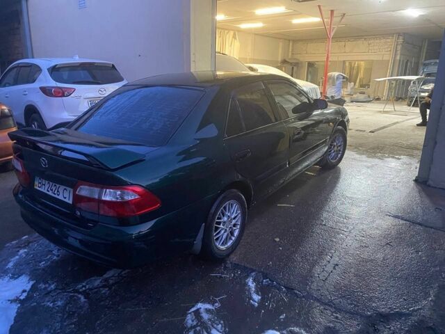 Зеленый Мазда 626, объемом двигателя 2 л и пробегом 236 тыс. км за 2650 $, фото 4 на Automoto.ua