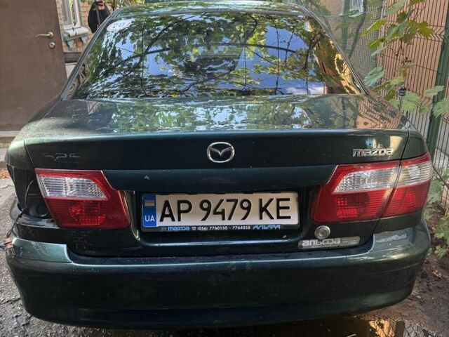 Зеленый Мазда 626, объемом двигателя 2 л и пробегом 300 тыс. км за 1500 $, фото 3 на Automoto.ua