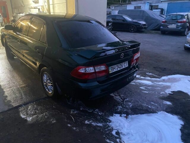 Зеленый Мазда 626, объемом двигателя 2 л и пробегом 236 тыс. км за 2650 $, фото 2 на Automoto.ua