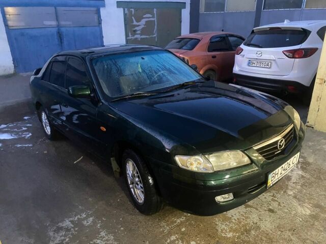 Зеленый Мазда 626, объемом двигателя 2 л и пробегом 236 тыс. км за 2650 $, фото 1 на Automoto.ua