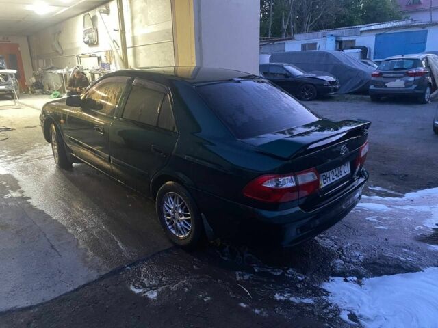 Зеленый Мазда 626, объемом двигателя 2 л и пробегом 236 тыс. км за 2650 $, фото 3 на Automoto.ua