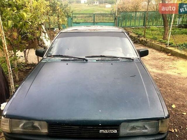 Зелений Мазда 626, об'ємом двигуна 2 л та пробігом 367 тис. км за 650 $, фото 4 на Automoto.ua