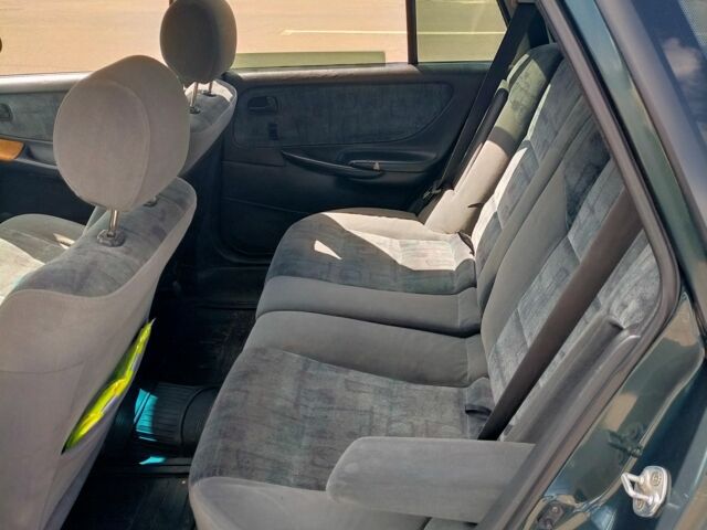 Зелений Мазда 626, об'ємом двигуна 2 л та пробігом 371 тис. км за 1500 $, фото 16 на Automoto.ua