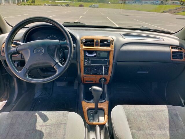 Зелений Мазда 626, об'ємом двигуна 2 л та пробігом 371 тис. км за 1500 $, фото 5 на Automoto.ua