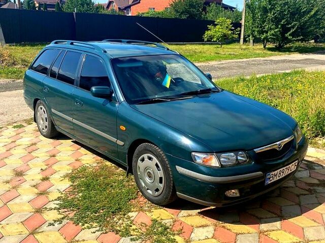 Зеленый Мазда 626, объемом двигателя 2 л и пробегом 400 тыс. км за 2500 $, фото 7 на Automoto.ua