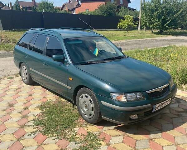 Зеленый Мазда 626, объемом двигателя 2 л и пробегом 400 тыс. км за 2500 $, фото 11 на Automoto.ua
