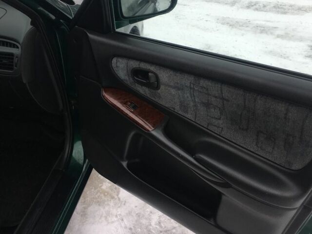 Зеленый Мазда 626, объемом двигателя 2 л и пробегом 320 тыс. км за 2700 $, фото 8 на Automoto.ua