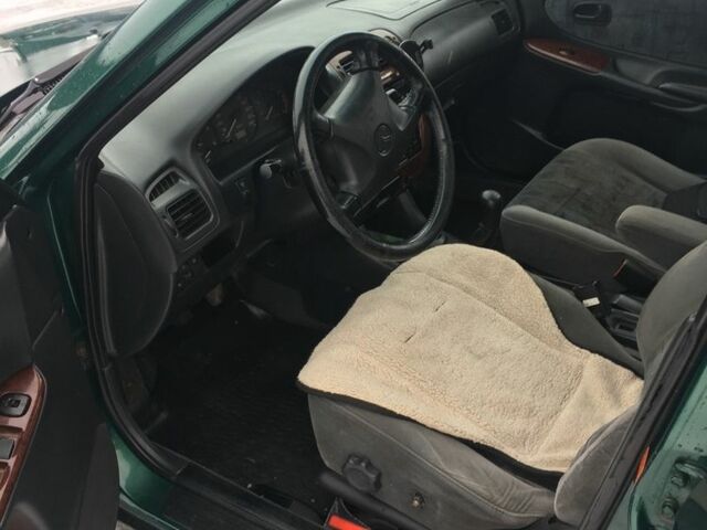 Зеленый Мазда 626, объемом двигателя 2 л и пробегом 320 тыс. км за 2700 $, фото 2 на Automoto.ua