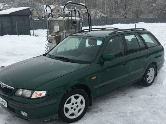 Зеленый Мазда 626, объемом двигателя 2 л и пробегом 320 тыс. км за 2700 $, фото 1 на Automoto.ua