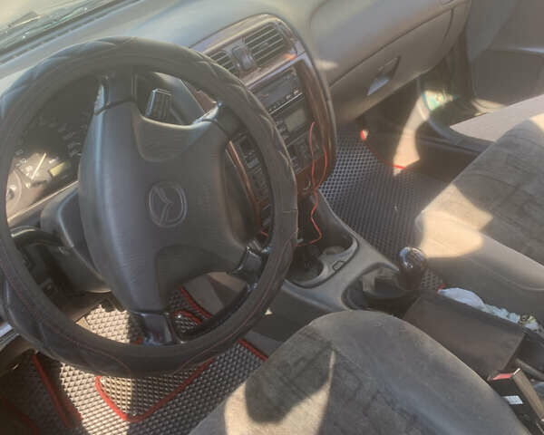 Зелений Мазда 626, об'ємом двигуна 2 л та пробігом 150 тис. км за 2500 $, фото 8 на Automoto.ua