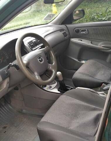 Зеленый Мазда 626, объемом двигателя 1.8 л и пробегом 435 тыс. км за 3500 $, фото 15 на Automoto.ua