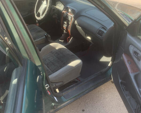 Зелений Мазда 626, об'ємом двигуна 2 л та пробігом 150 тис. км за 2500 $, фото 16 на Automoto.ua