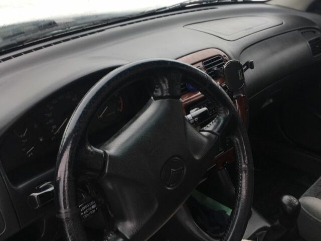 Зеленый Мазда 626, объемом двигателя 2 л и пробегом 320 тыс. км за 2700 $, фото 3 на Automoto.ua