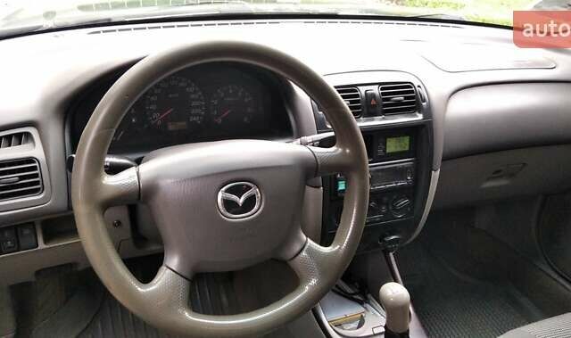 Зеленый Мазда 626, объемом двигателя 1.8 л и пробегом 435 тыс. км за 3500 $, фото 7 на Automoto.ua