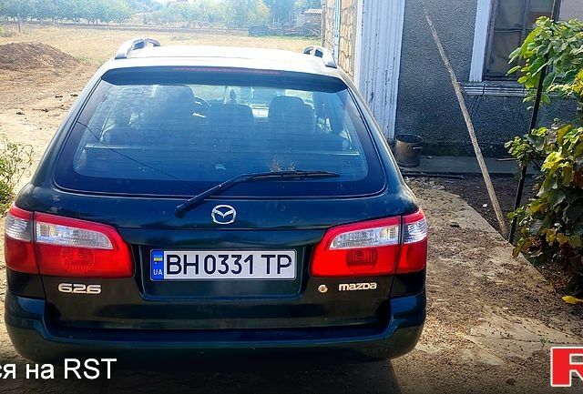 Зелений Мазда 626, об'ємом двигуна 2 л та пробігом 279 тис. км за 3100 $, фото 1 на Automoto.ua