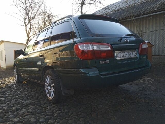 Зеленый Мазда 626, объемом двигателя 2 л и пробегом 458 тыс. км за 3000 $, фото 1 на Automoto.ua