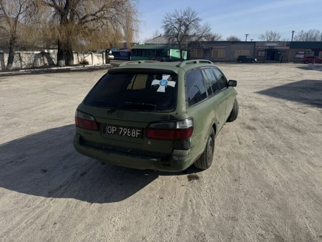 Зелений Мазда 626, об'ємом двигуна 2 л та пробігом 350 тис. км за 1550 $, фото 4 на Automoto.ua