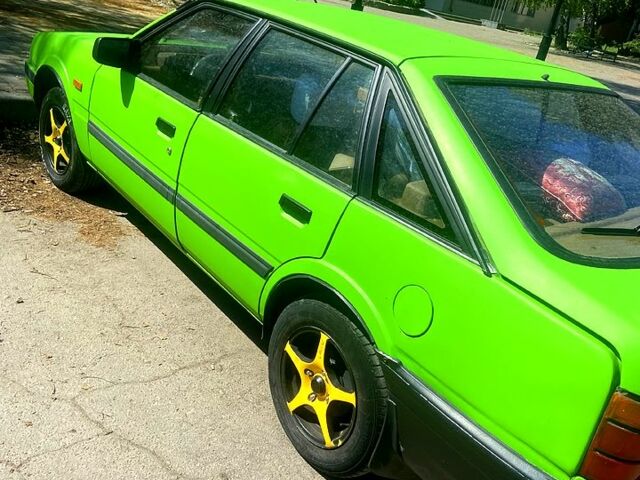 Зелений Мазда 626, об'ємом двигуна 2 л та пробігом 400 тис. км за 1200 $, фото 2 на Automoto.ua