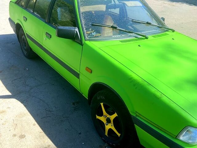 Зелений Мазда 626, об'ємом двигуна 2 л та пробігом 400 тис. км за 1200 $, фото 1 на Automoto.ua