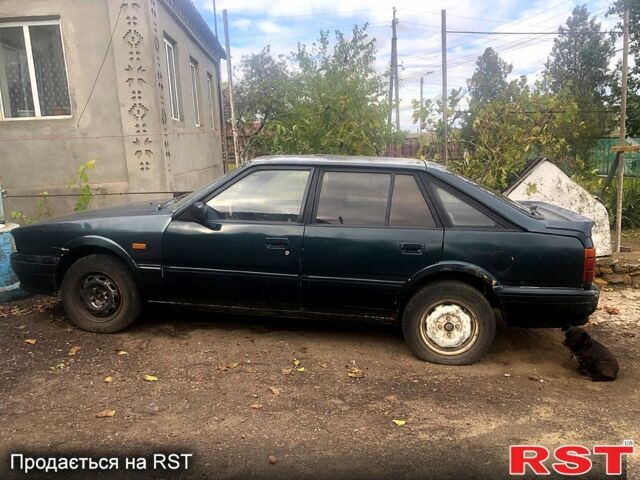 Зелений Мазда 626, об'ємом двигуна 2 л та пробігом 367 тис. км за 650 $, фото 1 на Automoto.ua