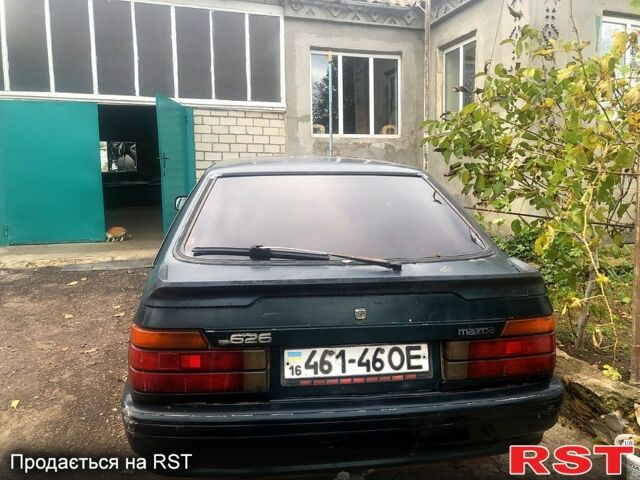 Зелений Мазда 626, об'ємом двигуна 2 л та пробігом 367 тис. км за 650 $, фото 4 на Automoto.ua