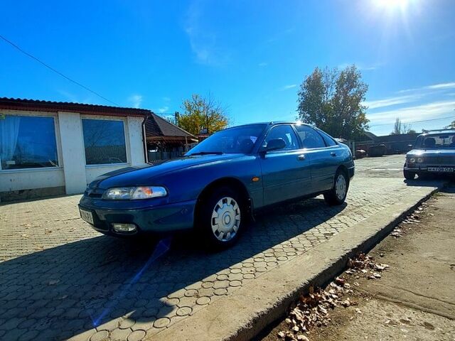 Зеленый Мазда 626, объемом двигателя 2 л и пробегом 250 тыс. км за 2300 $, фото 1 на Automoto.ua