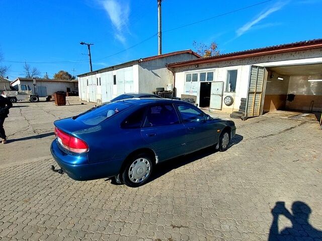 Зеленый Мазда 626, объемом двигателя 2 л и пробегом 250 тыс. км за 2300 $, фото 2 на Automoto.ua