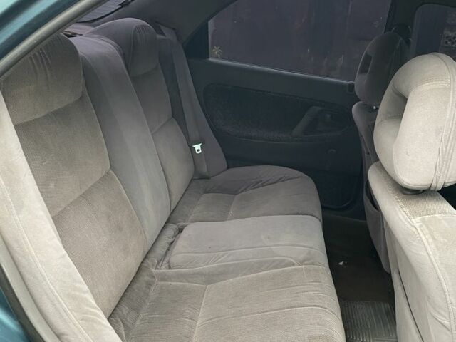 Зелений Мазда 626, об'ємом двигуна 1.8 л та пробігом 320 тис. км за 1300 $, фото 7 на Automoto.ua